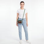 Green Trim Clear Camera Bag, studio model shot